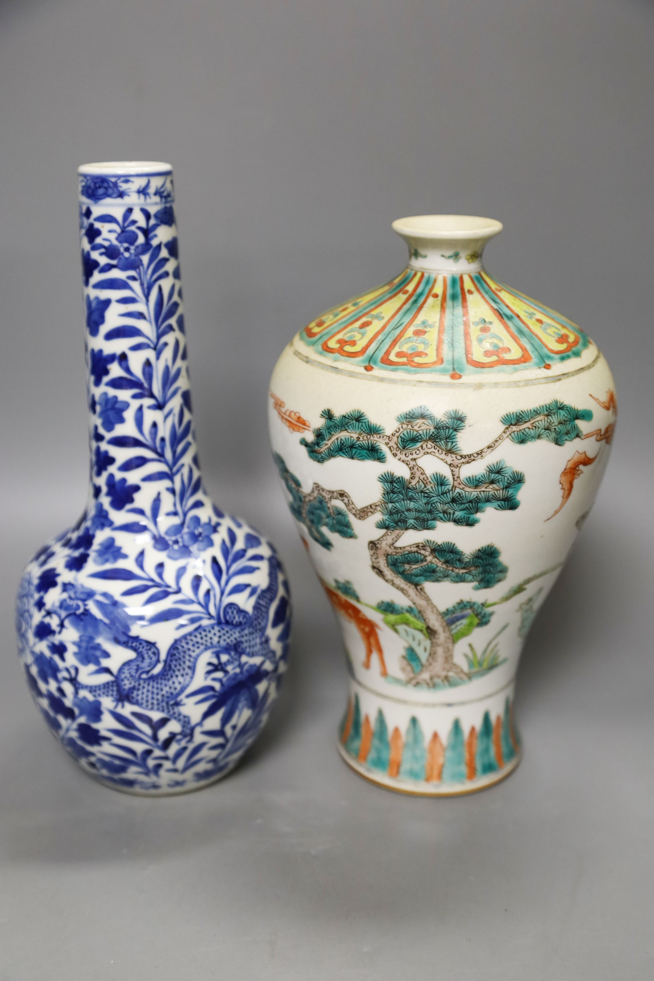 A Chinese famille verte meiping, two Chinese blue and white vases (both damaged) and a Masons vase, 19th/20th century Tallest 26cm